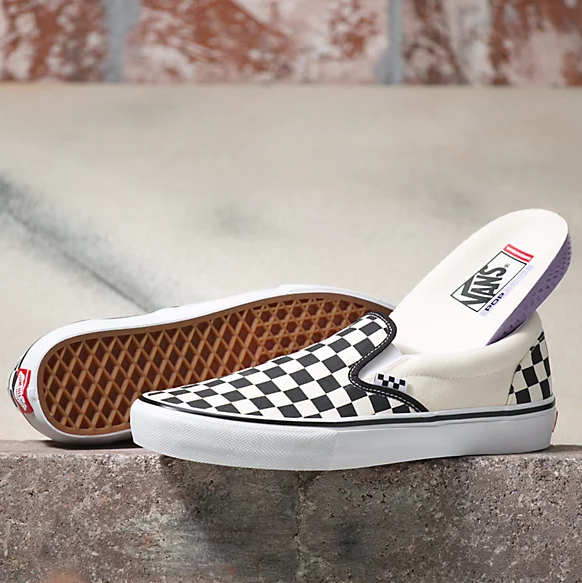 Vans checkered slip top ons black white